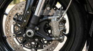 Motorcycle front brake disc and caliper system close-up